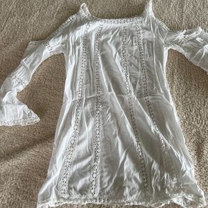 White tunic with cut outs